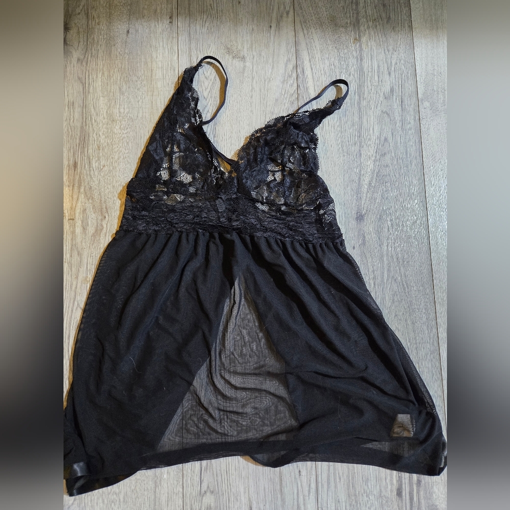 Avid Love lingerie black lace with peek through slit in the back.